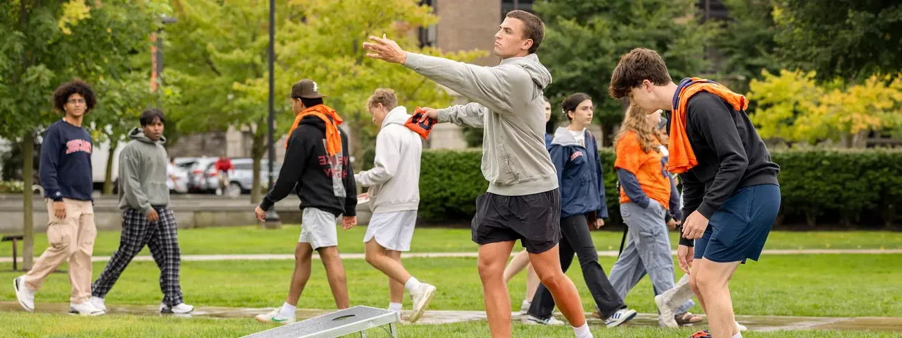 Members of Living Learning Communities gather to celebrate at the LLC Welcome Picnic on the Quad.